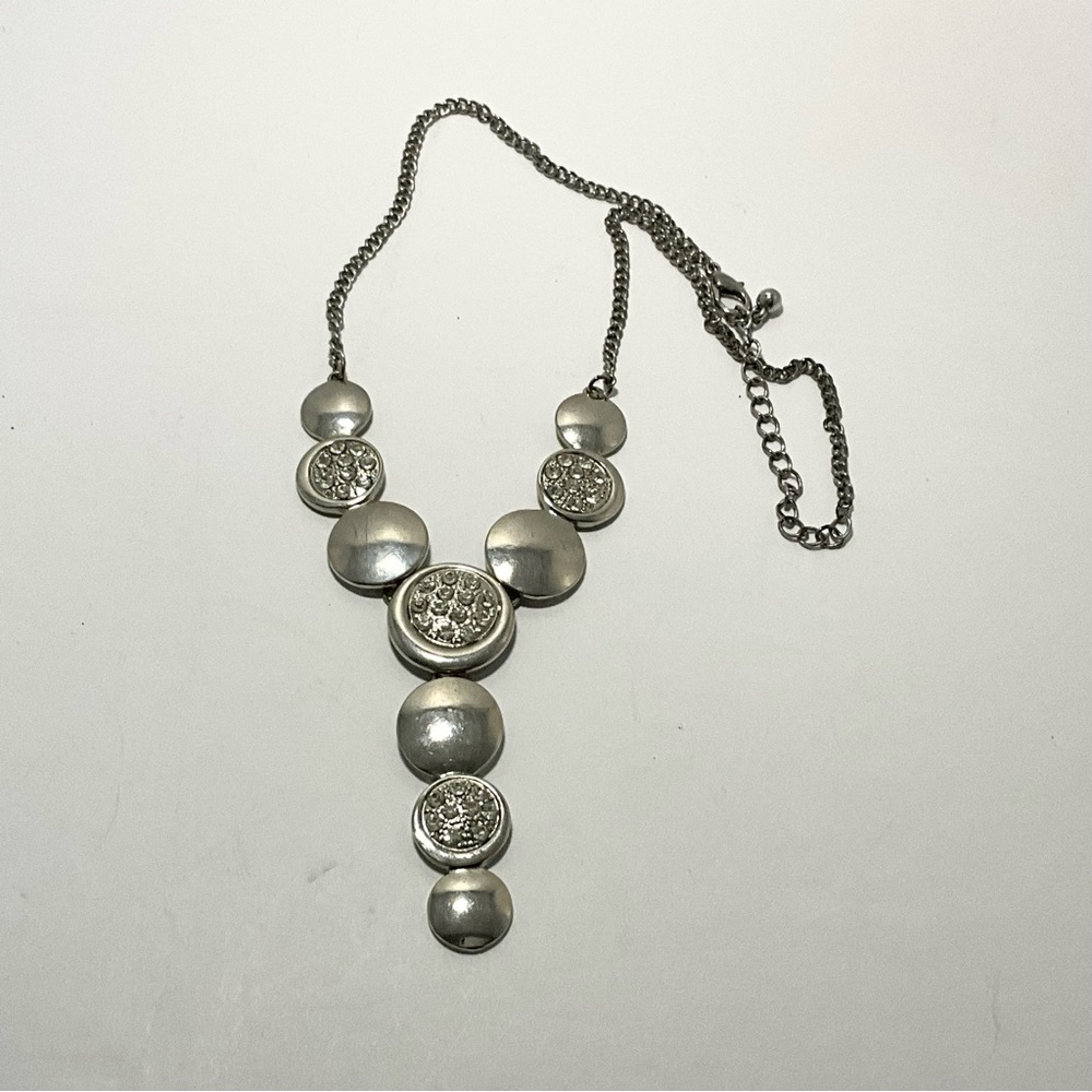 Silver-Toned Statement Necklace Featuring A Cascade Of Circular Pendants